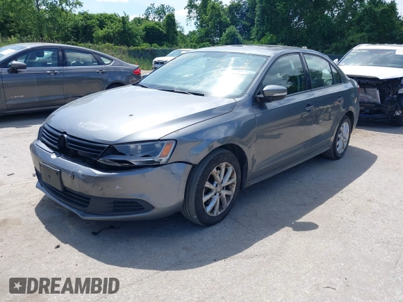 2012 Volkswagen Jetta SE z VIN 3VWDP7AJ4CM323219, wystawiony jako IAAI lot #42290353 z przebiegiem 313 663 mil mil oraz . Historia ofert i sprzedaży dostępna na DreamBid. Obrazek 2.