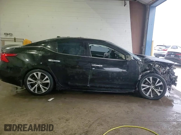 2016 Nissan Maxima SR with VIN 1N4AA6AP7GC902904, listed as a Copart auction lot 45145615 with 67,536 mi miles and Salvage title. Bid and sale history available at DreamBid. Image 14.