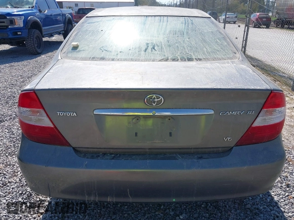2004 Toyota Camry LE with VIN 4T1BF30K94U576450, listed as a IAAI auction lot 40541915 with Not Provided miles and . Bid and sale history available at carsss.com. Image 15.