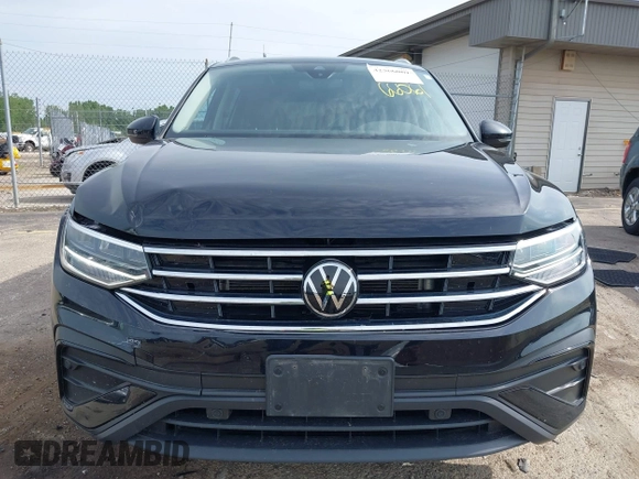 2023 Volkswagen Tiguan SE with VIN 3VVMB7AXXPM003447, listed as a IAAI auction lot 42566061 with 39,185 mi miles and . Bid and sale history available at DreamBid. Image 12.