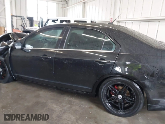 2012 Ford Fusion SE z VIN 3FAHP0HA5CR403929, wystawiony jako IAAI lot #42353429 z przebiegiem 208 668 mil mil oraz . Historia ofert i sprzedaży dostępna na DreamBid. Obrazek 14.