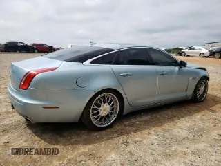 2013 Jaguar XJ with VIN SAJWA1C77D8V41738, listed as a Copart auction lot 53796225 with 104,063 mi miles and Salvage Title. Bid and sale history available at DreamBid. Image 3.