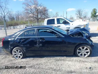 2014 Cadillac ATS Standard AWD with VIN 1G6AG5RX8E0140501, listed as a IAAI auction lot 41971554 with 122,656 mi miles and . Bid and sale history available at carsss.com. Image 13.