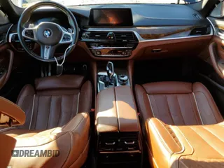 2020 BMW 5 Series M550i xDrive with VIN WBAJS7C0XLCE44248, listed as a Copart auction lot 48660045 with 73,949 mi miles and Salvage title. Bid and sale history available at DreamBid. Image 8.