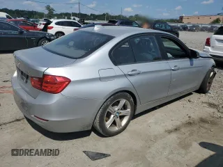 2013 BMW 3 Series 328i xDrive with VIN WBA3B5G56DNS00182, listed as a Copart auction lot 61920285 with Not provided miles and Salvage title. Bid and sale history available at DreamBid. Image 3.