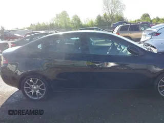 2014 Dodge Dart SXT with VIN 1C3CDFBB5ED909827, listed as a IAAI auction lot 42133689 with 100,214 mi miles and . Bid and sale history available at carsss.com. Image 14.