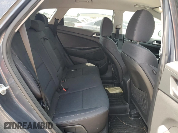 2019 Hyundai Tucson Value z VIN KM8J33A40KU914285, wystawiony jako Copart lot #54839375 z przebiegiem 81 214 mil mil oraz Szkoda całkowita • Salvage title. Historia ofert i sprzedaży dostępna na DreamBid. Obrazek 11.