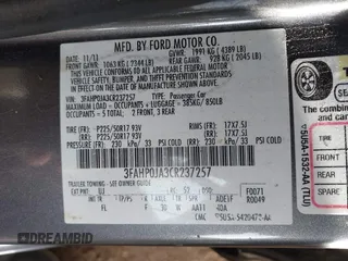 2012 Ford Fusion SEL with VIN 3FAHP0JA3CR237257, listed as a IAAI auction lot 41599093 with 219,800 mi miles. Bid and sale history available at carsss.com. Image 9.