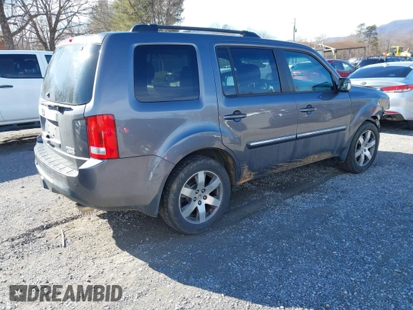 2014 Honda Pilot Touring with VIN 5FNYF4H95EB019048, listed as a IAAI auction lot 41526958 with 172,252 mi miles and . Bid and sale history available at DreamBid. Image 4.