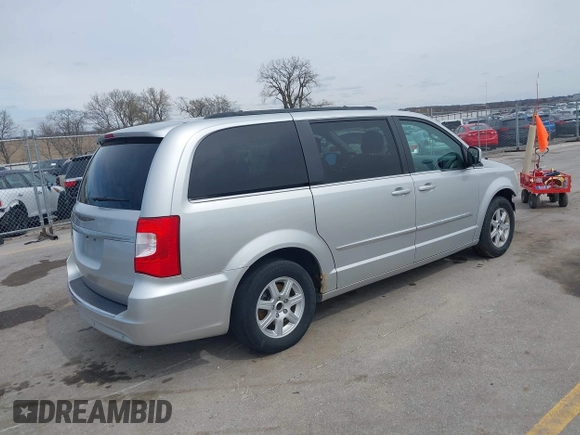 2012 Chrysler Town & Country Touring with VIN 2C4RC1BG5CR157712, listed as a IAAI auction lot 41942939 with 244,799 mi miles. Bid and sale history available at carsss.com. Image 4.