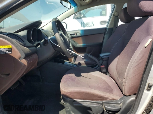 2010 Kia Forte EX z VIN KNAFU4A24A5054277, wystawiony jako Copart lot #56007995 z przebiegiem 218 782 mil mil oraz Szkody całkowita. Historia ofert i sprzedaży dostępna na DreamBid. Obrazek 7.
