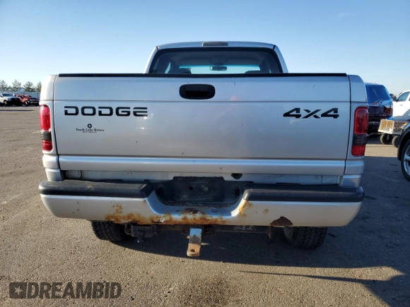 2001 Dodge Ram 2500 with VIN 3B7KF23Z31G821023, listed as a Copart auction lot 82185604 with 77,364 mi miles and Clean Title. Bid and sale history available at carsss.com. Image 6.