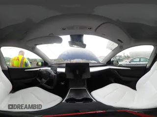 2023 Tesla Model Y Long Range z VIN 7SAYGDEE6PF603981, wystawiony jako IAAI lot #42133348 z przebiegiem 28 566 mil mil oraz . Historia ofert i sprzedaży dostępna na DreamBid. Obrazek 19.