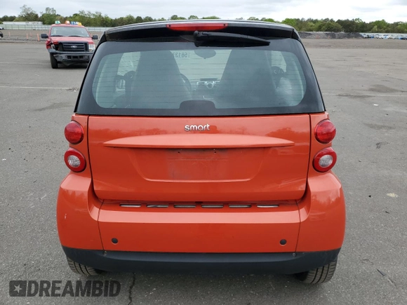2008 Smart fortwo Pure z VIN WMEEJ31X18K155044, wystawiony jako Copart lot #58137355 z przebiegiem 62 718 mil mil oraz Szkody całkowita. Historia ofert i sprzedaży dostępna na DreamBid. Obrazek 6.