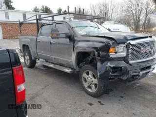 2016 GMC Sierra 2500HD Denali z VIN 1GT12UE81GF128498, wystawiony jako IAAI lot #41346398 z przebiegiem 164 532 mil mil oraz . Historia ofert i sprzedaży dostępna na DreamBid. Obrazek 1.
