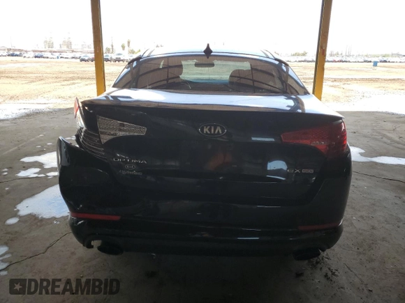 2013 Kia Optima EX z VIN 5XXGN4A75DG253693, wystawiony jako Copart lot #59227785 z przebiegiem 191 062 mil mil oraz Szkoda całkowita • Salvage title. Historia ofert i sprzedaży dostępna na DreamBid. Obrazek 6.