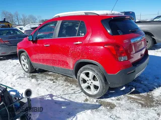2016 Chevrolet Trax LTZ with VIN KL7CJRSB3GB569465, listed as a IAAI auction lot 41271637 with 152,503 mi miles. Bid and sale history available at carsss.com. Image 3.