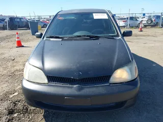 2002 Toyota ECHO with VIN JTDBT123120243848, listed as a IAAI auction lot 41677515 with 287,759 mi miles. Bid and sale history available at carsss.com. Image 6.