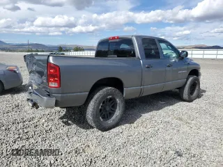 2005 Dodge 1500 SLT z VIN 1D7HU18D95S240346, wystawiony jako Copart lot #56873935 z przebiegiem 306 734 mil mil oraz Szkoda całkowita • Salvage title. Historia ofert i sprzedaży dostępna na DreamBid. Obrazek 3.