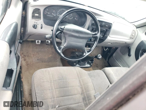 1996 Ford Ranger XL with VIN 1FTCR10A2TUD70395, listed as a Copart auction lot 52977425 with 403,506 mi miles and Non repairable. Bid and sale history available at DreamBid. Image 8.
