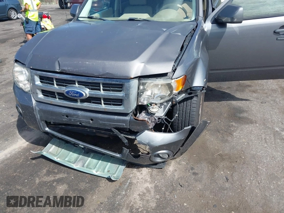 2011 Ford Escape Limited with VIN 1FMCU9EG2BKC55005, listed as a IAAI auction lot 41958212 with 188,182 mi miles. Bid and sale history available at carsss.com. Image 6.