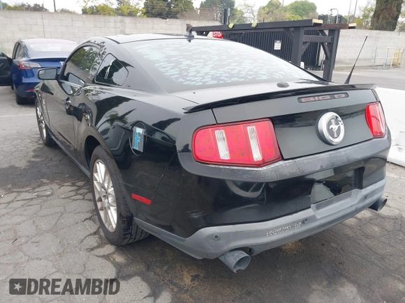 2012 Ford Mustang Premium with VIN 1ZVBP8AM3C5234884, listed as a IAAI auction lot 41880779 with 149,758 mi miles and . Bid and sale history available at DreamBid. Image 3.