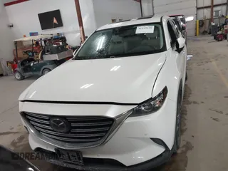 2020 Mazda CX-9 Touring z VIN JM3TCBCY8L0405360, wystawiony jako IAAI lot #41419428 z przebiegiem 69 917 mil mil oraz . Historia ofert i sprzedaży dostępna na DreamBid. Obrazek 12.