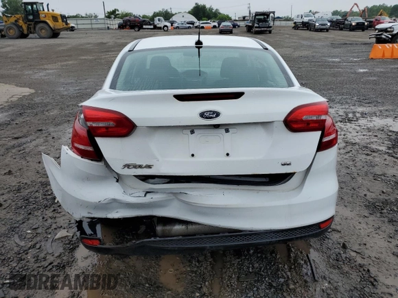 2016 Ford Focus SE z VIN 1FADP3F22GL260860, wystawiony jako Copart lot #61085065 z przebiegiem 136 160 mil mil oraz Szkoda całkowita • Salvage title. Historia ofert i sprzedaży dostępna na DreamBid. Obrazek 6.