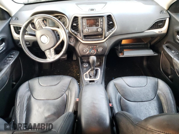 2016 Jeep Cherokee Altitude with VIN 1C4PJMAB1GW309776, listed as a Copart auction lot 81203204 with 105,775 mi miles and Salvage title. Bid and sale history available at DreamBid. Image 8.