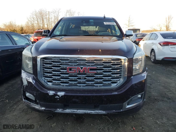 2017 GMC Yukon Denali with VIN 1GKS2CKJ4HR316877, listed as a Copart auction lot 82426694 with 129,239 mi miles and Salvage Title. Bid and sale history available at carsss.com. Image 5.