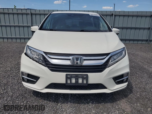 2019 Honda Odyssey Touring z VIN 5FNRL6H80KB501681, wystawiony jako Copart lot #58814945 z przebiegiem 105 287 mil mil oraz Szkoda całkowita • Salvage title. Historia ofert i sprzedaży dostępna na DreamBid. Obrazek 5.
