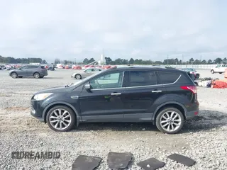 2014 Ford Escape SE with VIN 1FMCU0G9XEUE35271, listed as a IAAI auction lot 40896477 with 139,444 mi miles. Bid and sale history available at carsss.com. Image 14.
