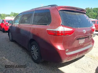2015 Toyota Sienna XLE with VIN 5TDYK3DC3FS666438, listed as a IAAI auction lot 42117980 with 121,084 mi miles and . Bid and sale history available at DreamBid. Image 3.
