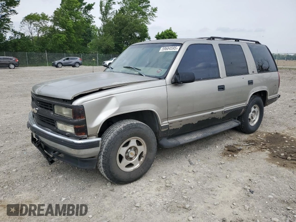 1999 Chevrolet Tahoe Z71 with VIN 1GNEK13R6XJ301562, listed as a Copart auction lot 59684595 with 200,561 mi miles and Salvage title. Bid and sale history available at DreamBid. Image 1.