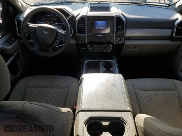 2022 Ford F-350 XL with VIN 1FT8W3DT9NEC09111, listed as a Copart auction lot 52178455 with 128,690 mi miles and Salvage title. Bid and sale history available at DreamBid. Image 8.