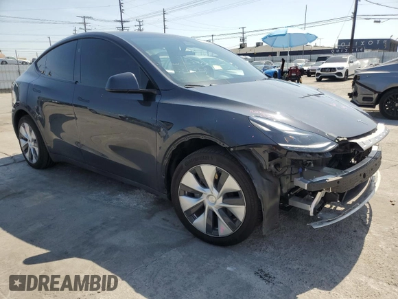 2024 Tesla Model Y Long Range z VIN 7SAYGDEE0RF024326, wystawiony jako Copart lot #52149675 z przebiegiem 34 503 mil mil oraz Szkoda całkowita • Salvage title. Historia ofert i sprzedaży dostępna na DreamBid. Obrazek 4.
