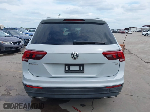 2018 Volkswagen Tiguan S with VIN 3VV1B7AX0JM092116, listed as a IAAI auction lot 42388339 with 103,412 mi miles and . Bid and sale history available at DreamBid. Image 16.