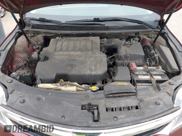 2013 Toyota Avalon XLE with VIN 4T1BK1EB1DU001297, listed as a IAAI auction lot 42041699 with 217,190 mi miles and . Bid and sale history available at DreamBid. Image 10.