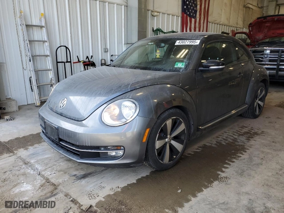 2012 Volkswagen Beetle 2.0T Turbo PZEV with VIN 3VWVA7AT1CM656081, listed as a Copart auction lot 43027995 with 63,802 mi miles and Clean Title. Bid and sale history available at carsss.com. Image 1.
