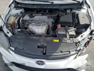 2014 Scion tC z VIN JTKJF5C70E3084697, wystawiony jako Copart lot #54307295 z przebiegiem 174 073 mil mil oraz Szkoda całkowita • Salvage title. Historia ofert i sprzedaży dostępna na DreamBid. Obrazek 11.