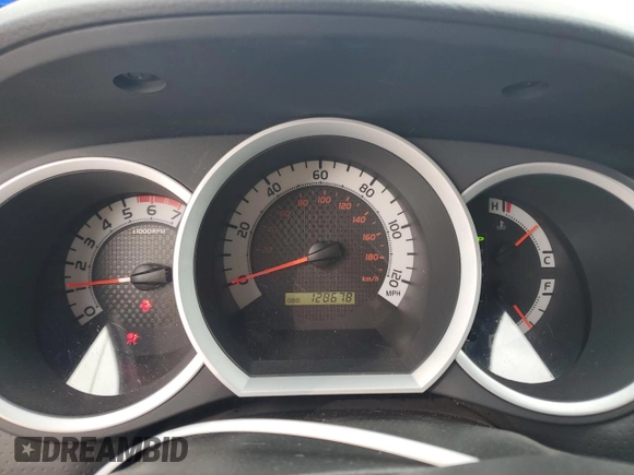 2014 Toyota Tacoma with VIN 3TMMU4FN0EM072840, listed as a Copart auction lot 51740805 with 128,678 mi miles and Salvage title. Bid and sale history available at DreamBid. Image 9.