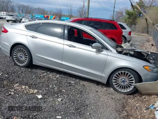 2016 Ford Fusion Titanium with VIN 3FA6P0K95GR400718, listed as a IAAI auction lot 41957913 with 133,037 mi miles. Bid and sale history available at carsss.com. Image 1.