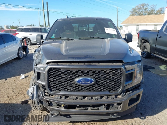 2018 Ford F-150 XL with VIN 1FTEW1EP9JFE03456, listed as a IAAI auction lot 41741500 with 104,123 mi miles. Bid and sale history available at carsss.com. Image 12.