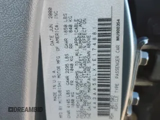 2000 Mitsubishi Galant LS with VIN 4A3AA56LXYE174881, listed as a Copart auction lot 79727154 with 106,001 mi miles and Salvage Title. Bid and sale history available at carsss.com. Image 12.