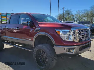 2017 Nissan Titan XD SL with VIN 1N6BA1F44HN548942, listed as a Copart auction lot 44103645 with 90,242 mi miles and Clean Title. Bid and sale history available at carsss.com. Image 1.