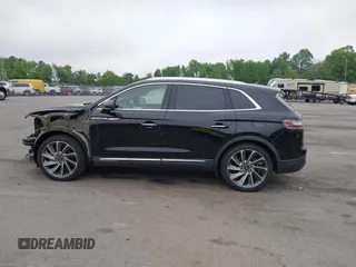 2019 Lincoln Nautilus Reserve z VIN 2LMPJ6LP8KBL19297, wystawiony jako IAAI lot #42117968 z przebiegiem 64 427 mil mil oraz . Historia ofert i sprzedaży dostępna na DreamBid. Obrazek 14.
