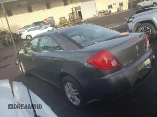 2005 Pontiac G6 z VIN 1G2ZG528754153479, wystawiony jako Copart lot #45721305 z przebiegiem Nie podano mil oraz Szkoda całkowita • Salvage title. Historia ofert i sprzedaży dostępna na DreamBid. Obrazek 2.