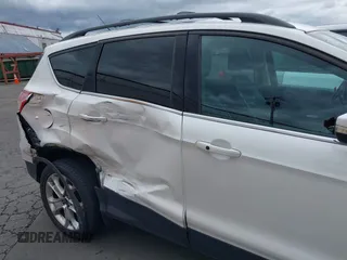 2013 Ford Escape SEL с VIN 1FMCU9H99DUC62280, выставлен на аукционе IAAI как лот 42430435 с пробегом 112 411 миль миль и . История ставок и продаж доступна на DreamBid. Изображение 17.