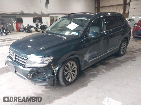 2018 Volkswagen Tiguan SEL with VIN 3VV2B7AX3JM133326, listed as a IAAI auction lot 42459190 with 94,665 mi miles and . Bid and sale history available at DreamBid. Image 2.