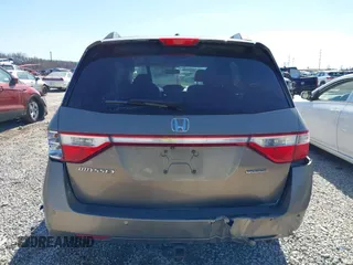 2012 Honda Odyssey Touring with VIN 5FNRL5H9XCB110672, listed as a IAAI auction lot 41826895 with 159,927 mi miles. Bid and sale history available at carsss.com. Image 16.
